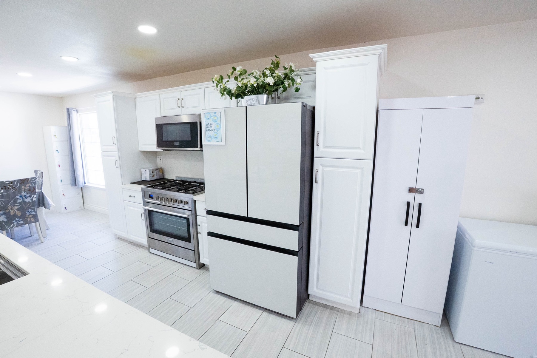 Clean, organized kitchen where medication storage and meal preparation are handled with care